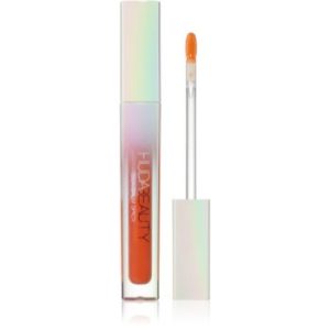 Huda Beauty Silk Balm Spicy Luciu de buze transparent pentru creșterea volumului cu efect termogen